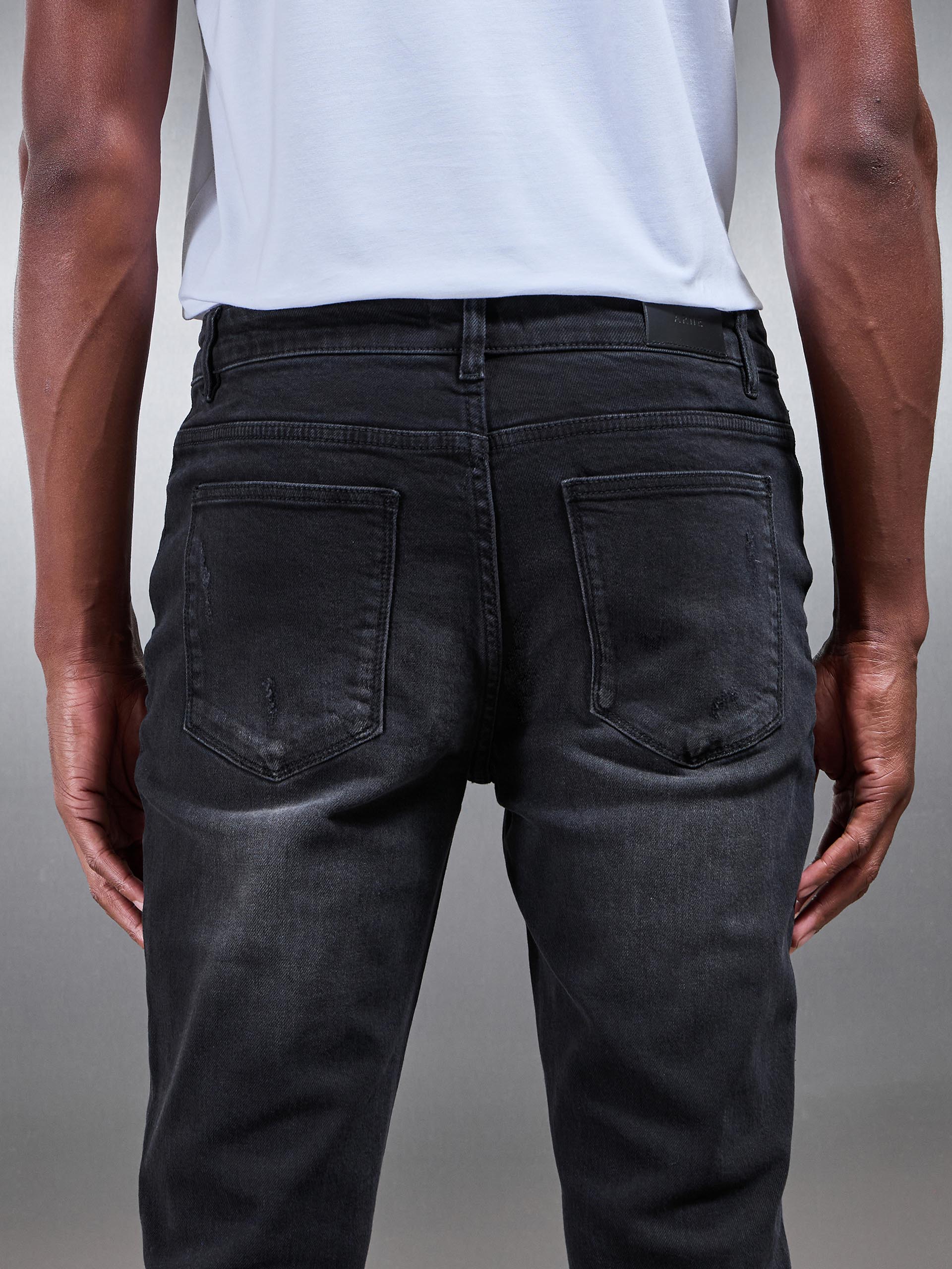 Distressed Denim Jeans in Black Wash - Image 6