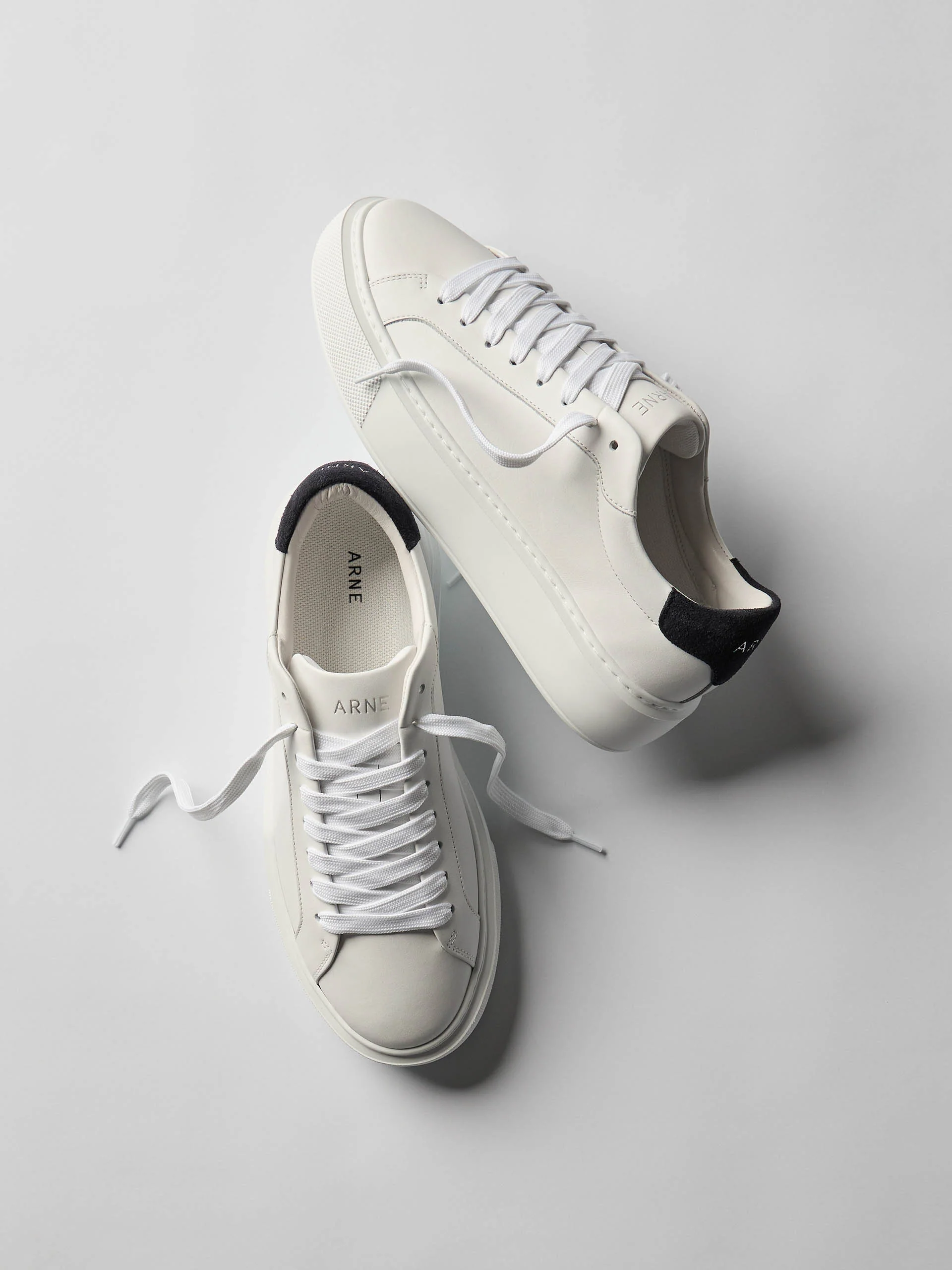 Essential Leather Trainer in White Navy - Image 2