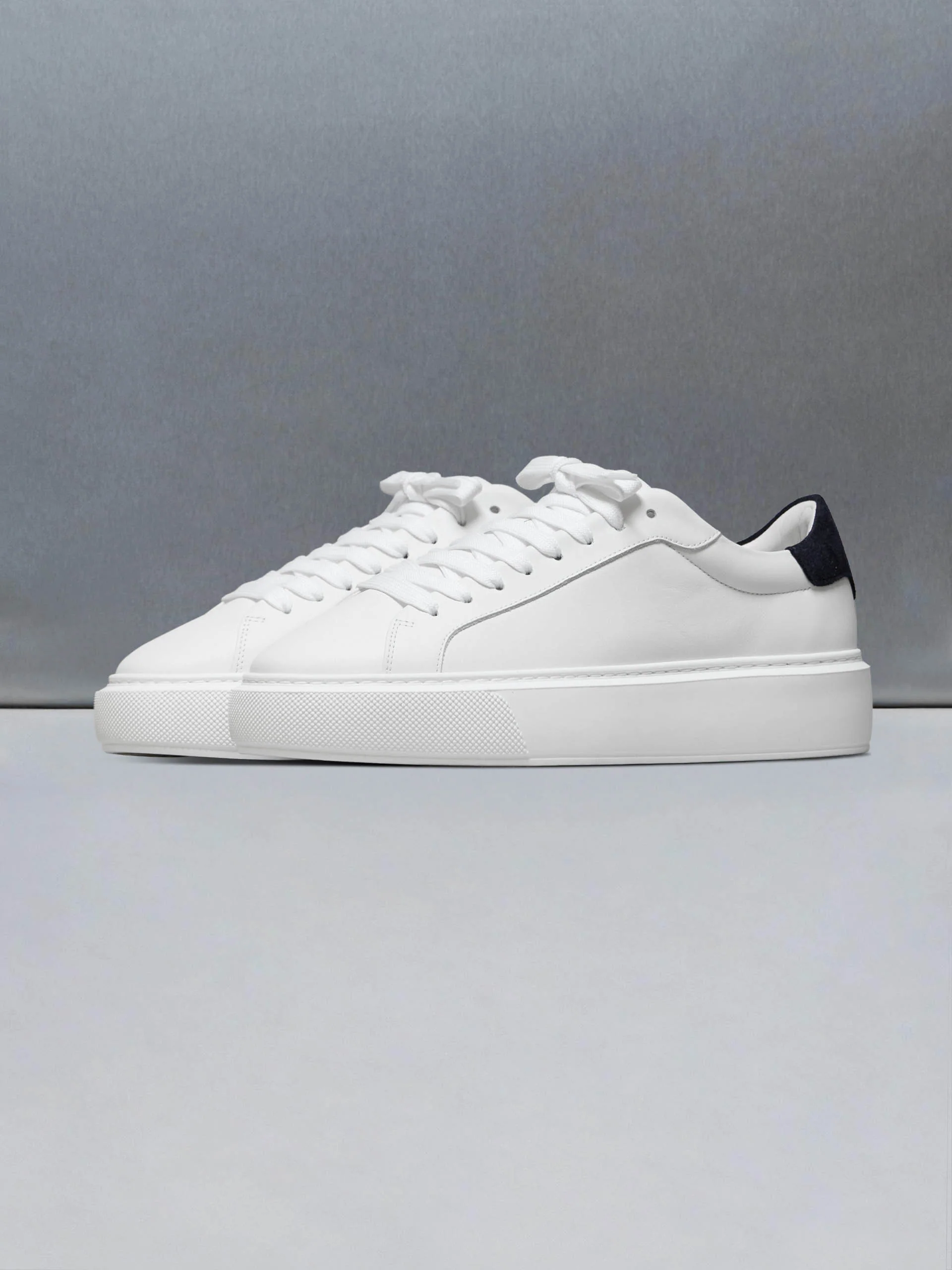 Essential Leather Trainer in White Navy - Image 3
