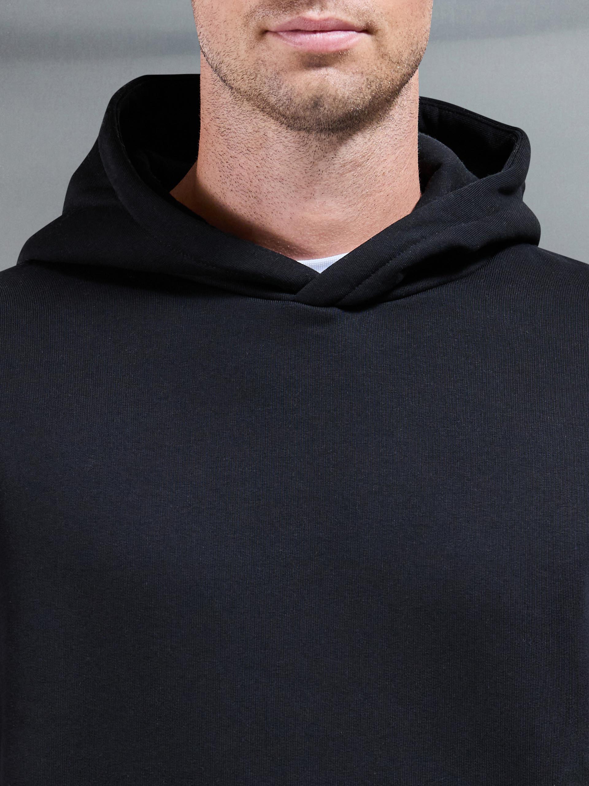 Essential Relaxed Hoodie in Black - Image 3