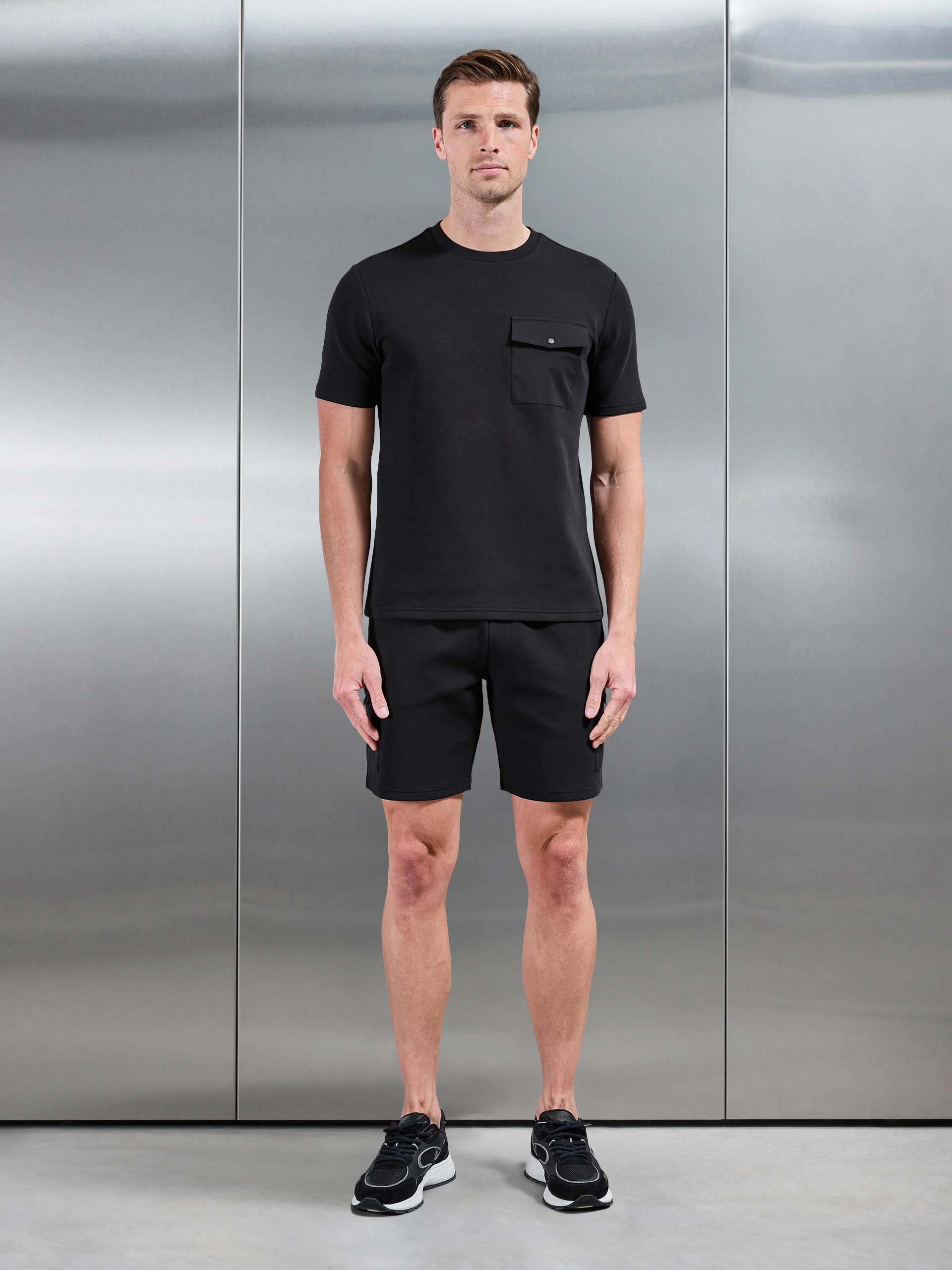 Everyday Luxe Hybrid Cargo Short in Black - Image 5