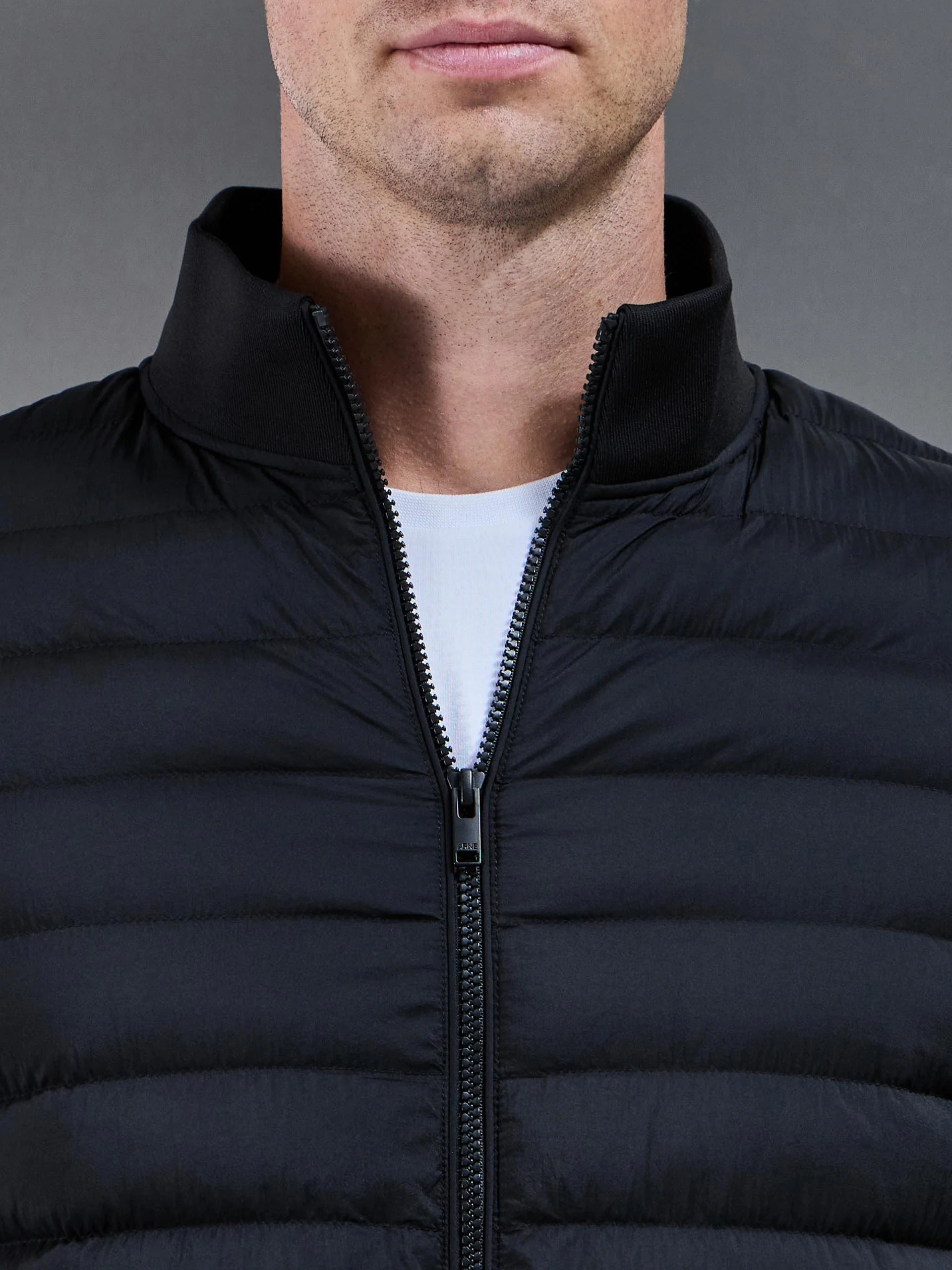 Hybrid Quilted Technical Funnel Neck Jacket in Black - Image 4