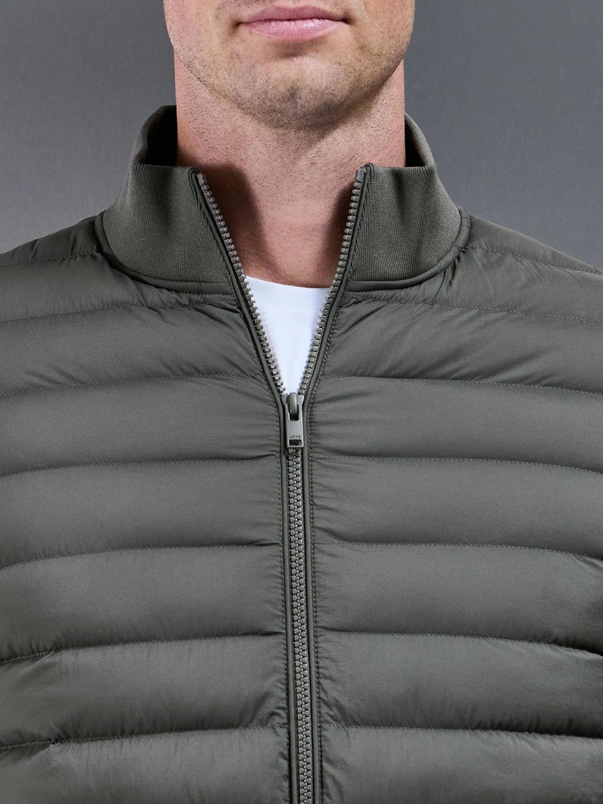 Hybrid Quilted Technical Funnel Neck Jacket in Olive - Image 3
