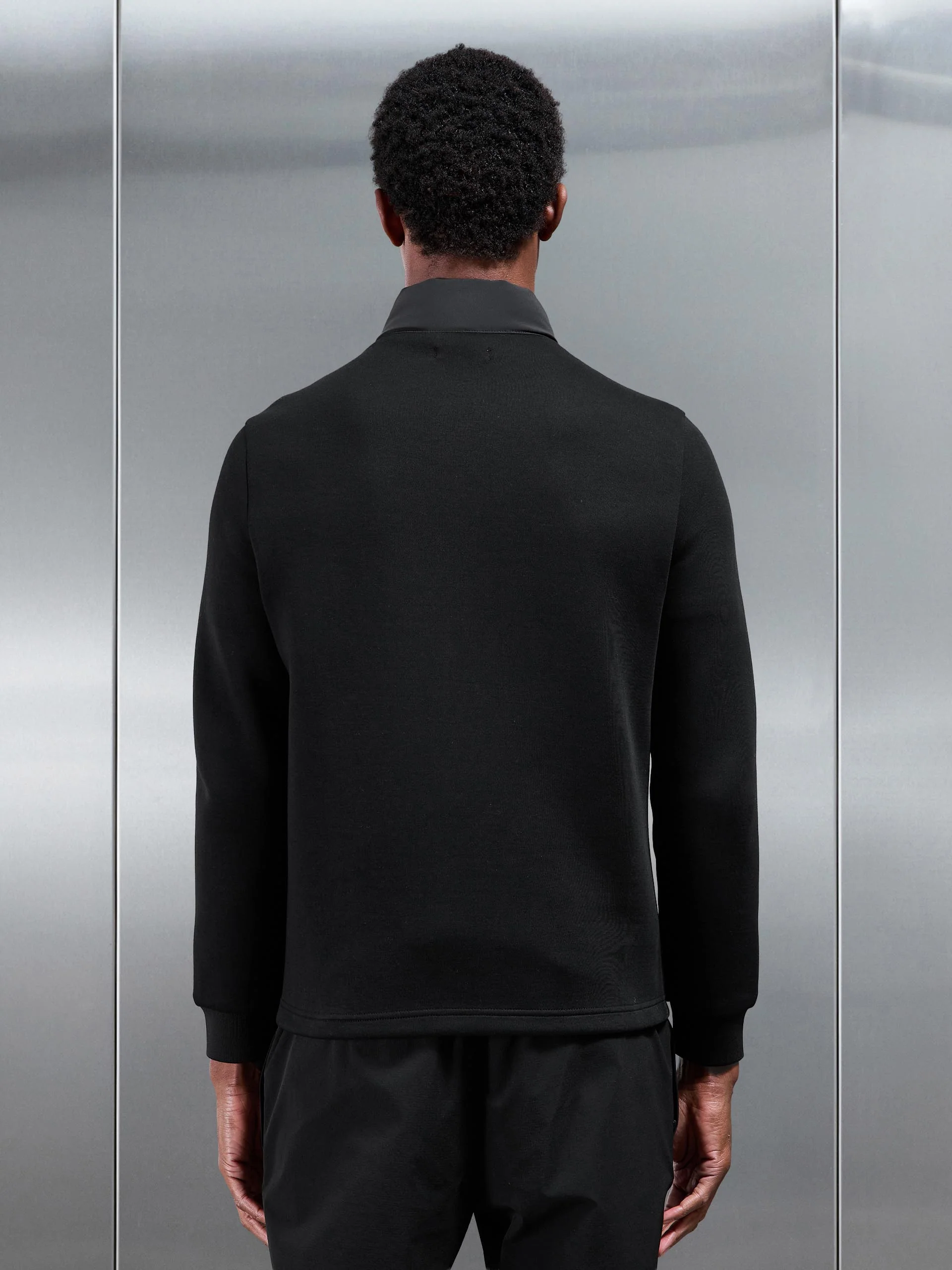 Hybrid Technical Puffer Jacket in Black - Image 3