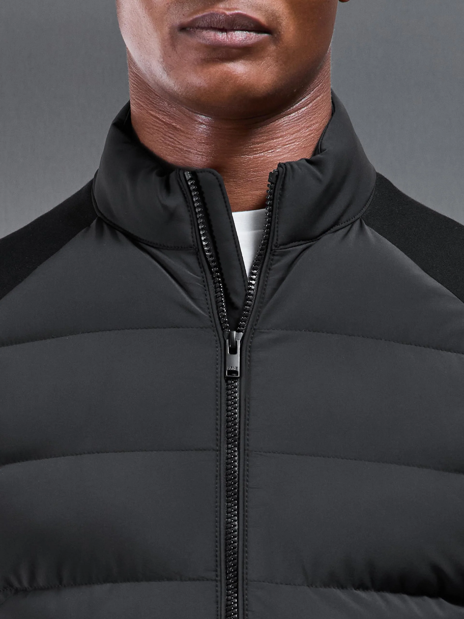 Hybrid Technical Puffer Jacket in Black - Image 5