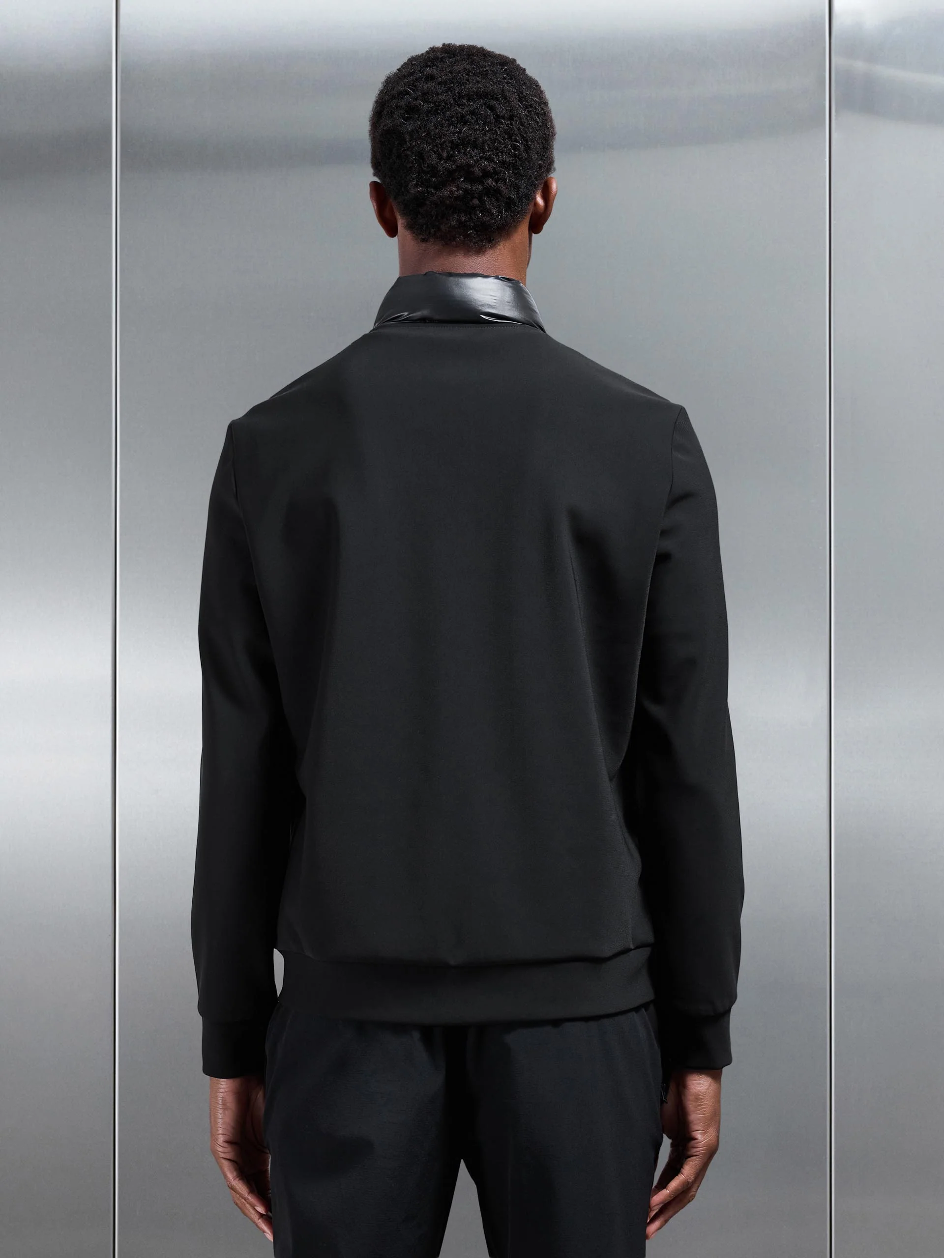 Hybrid Zip Through Puffer Jacket in Black - Image 3