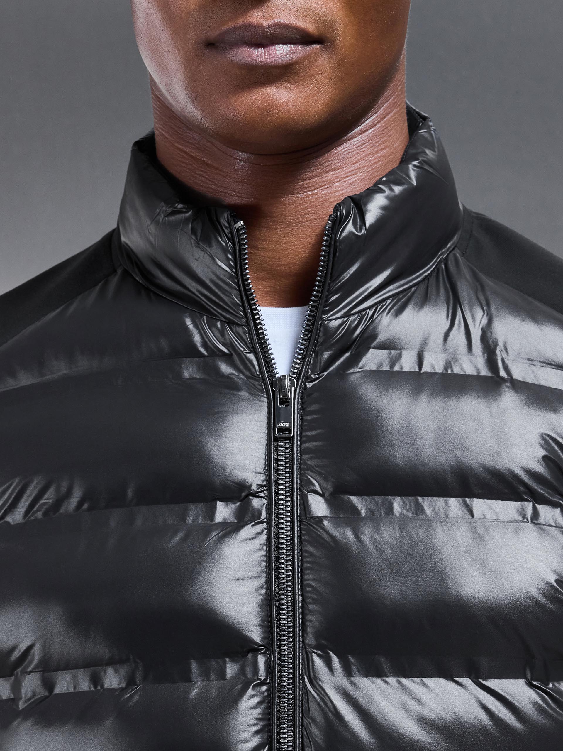 Hybrid Zip Through Puffer Jacket in Black - Image 5