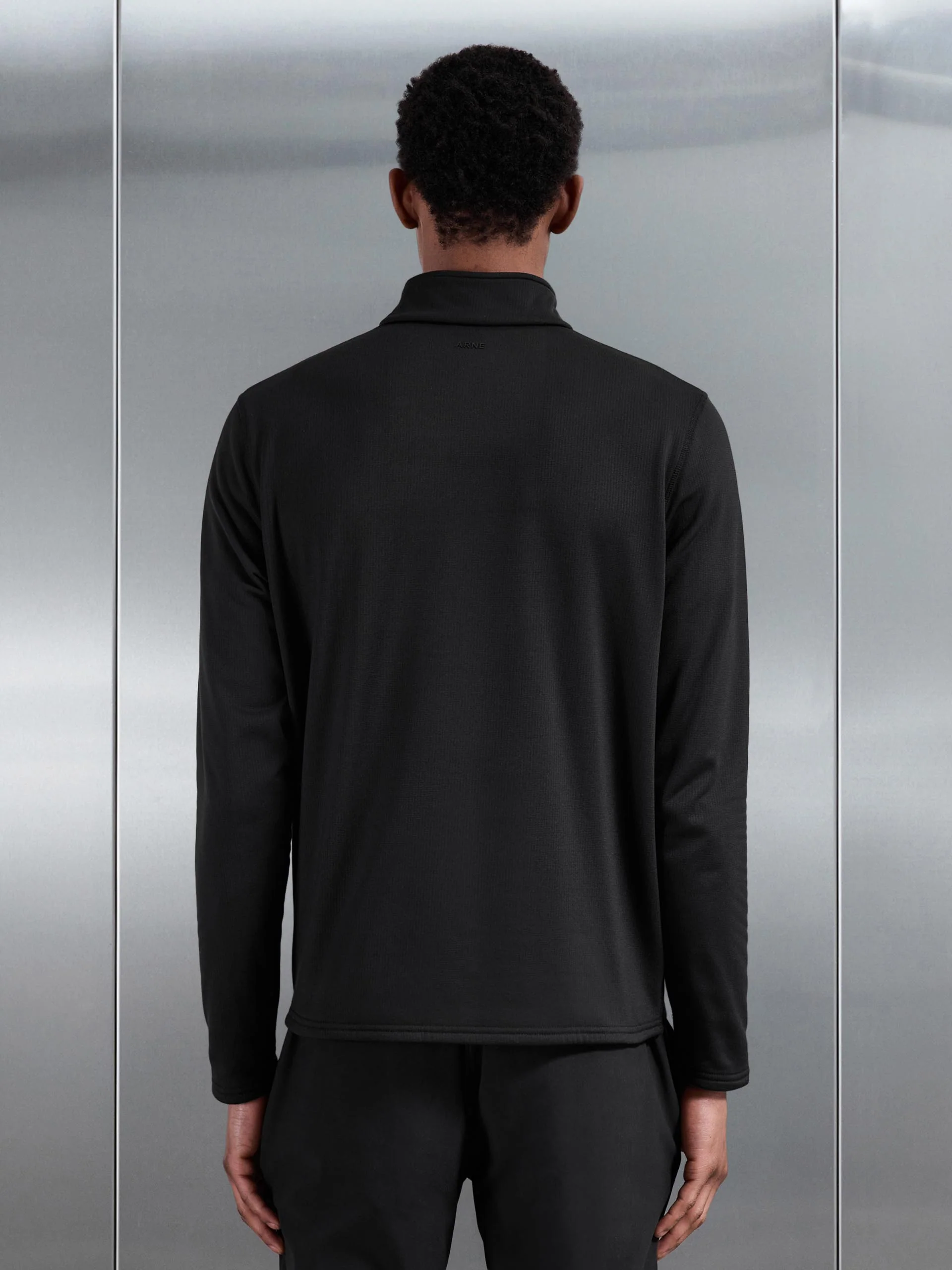 Insulating Golf Mid Layer in Black - Image 5