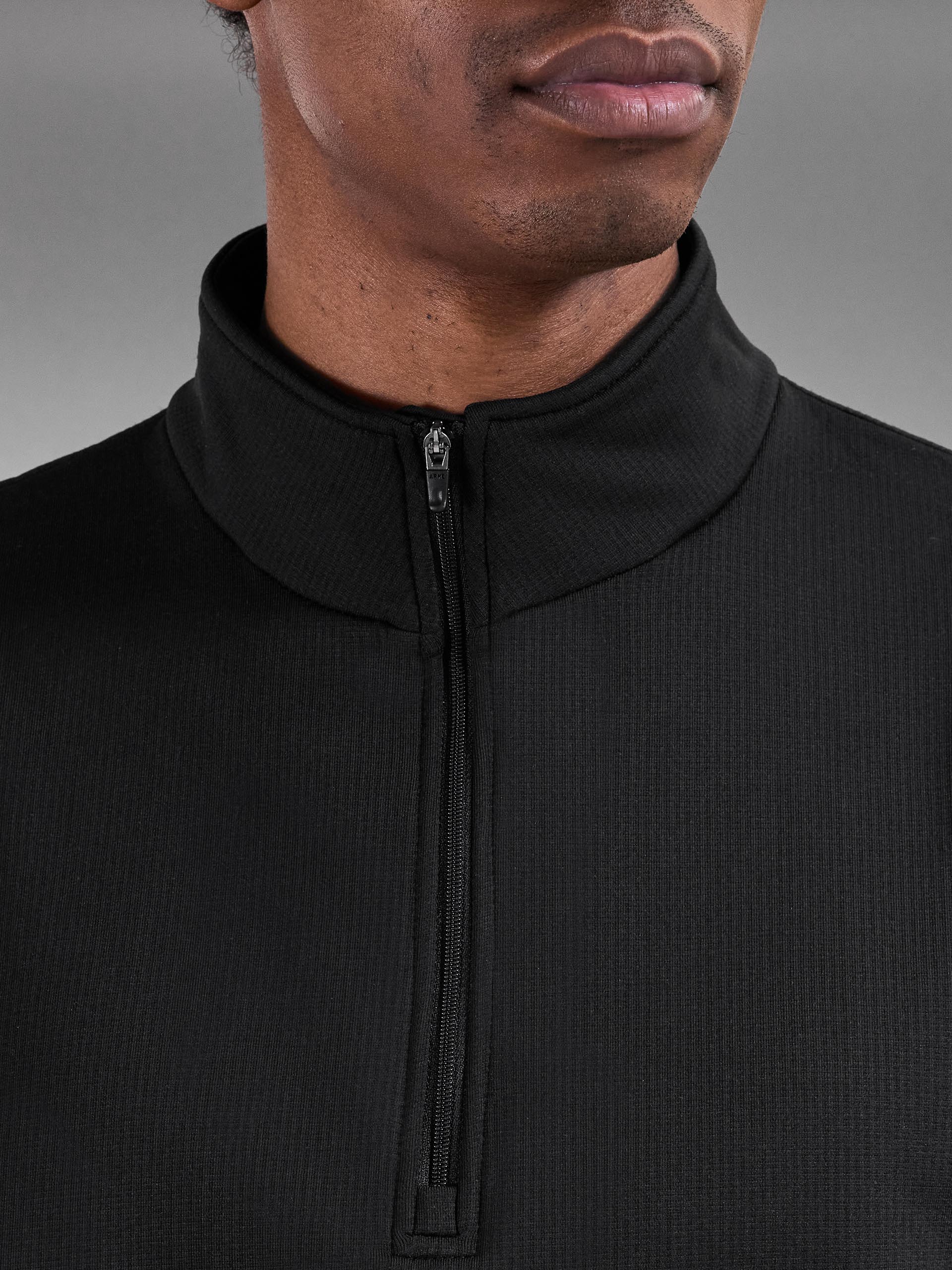 Insulating Golf Mid Layer in Black - Image 6