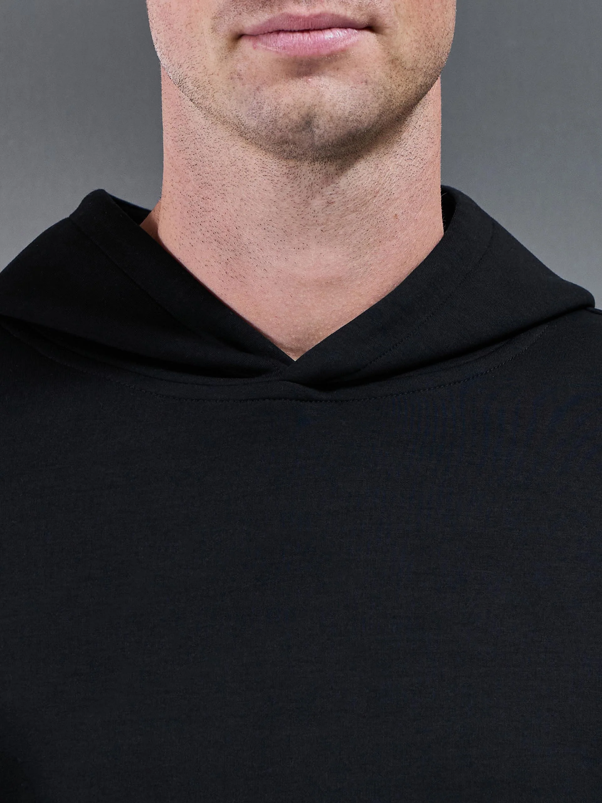 Interlock Jersey Essential Hoodie in Black - Image 4