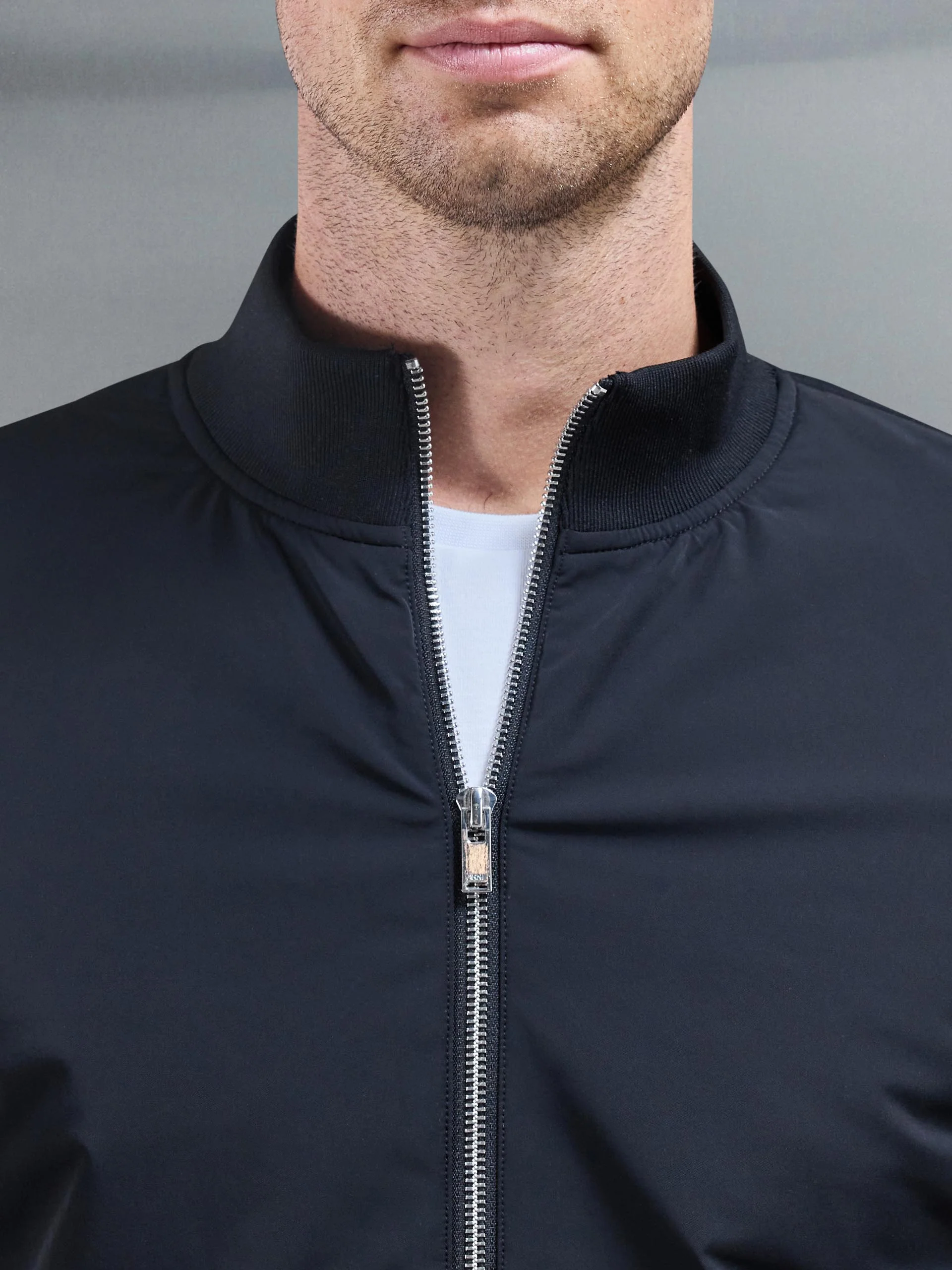 Interlock Jersey Hybrid Funnel Neck Jacket in Black - Image 3