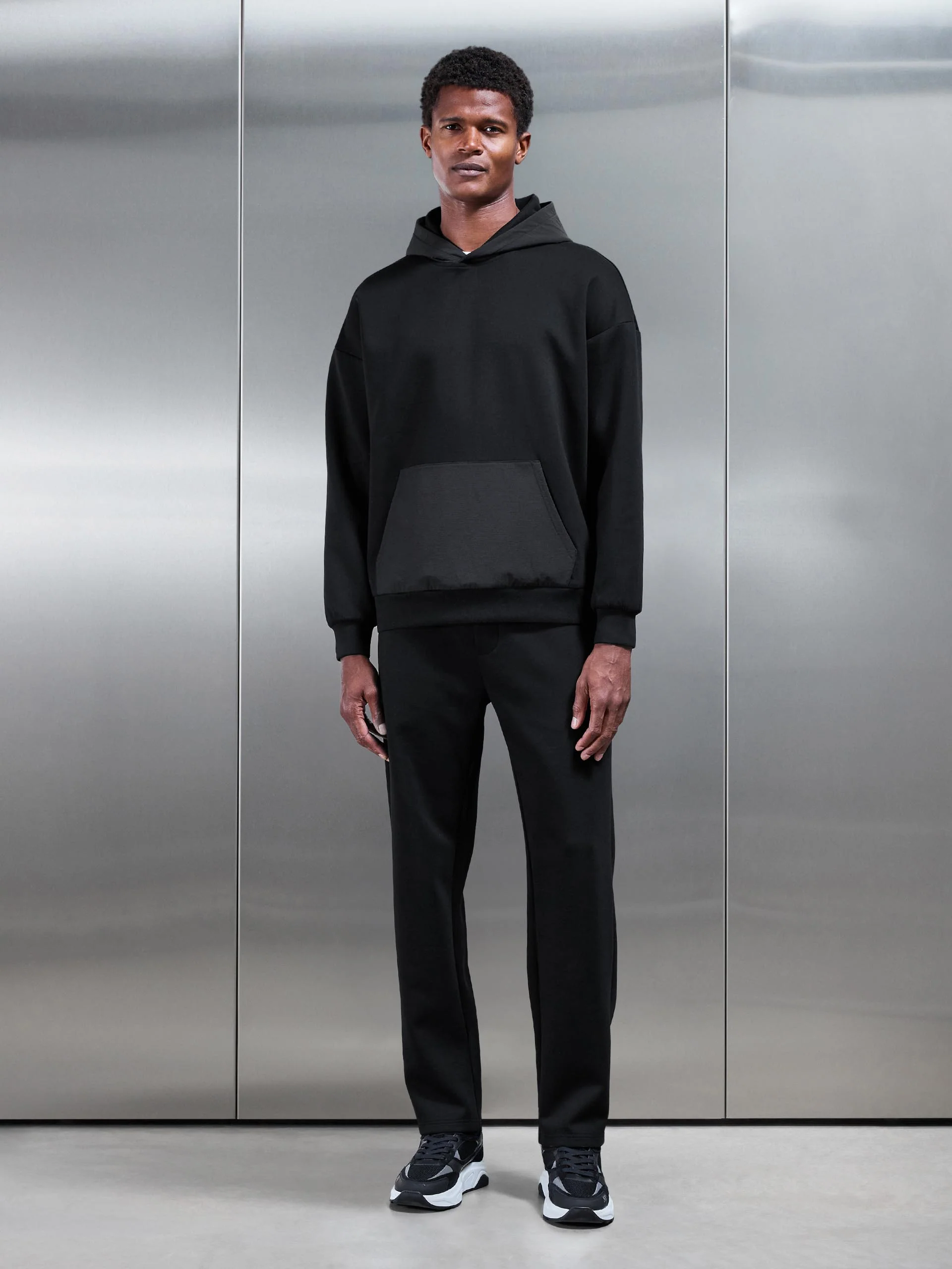 Interlock Jersey Hybrid Relaxed Hoodie in Black - Image 2