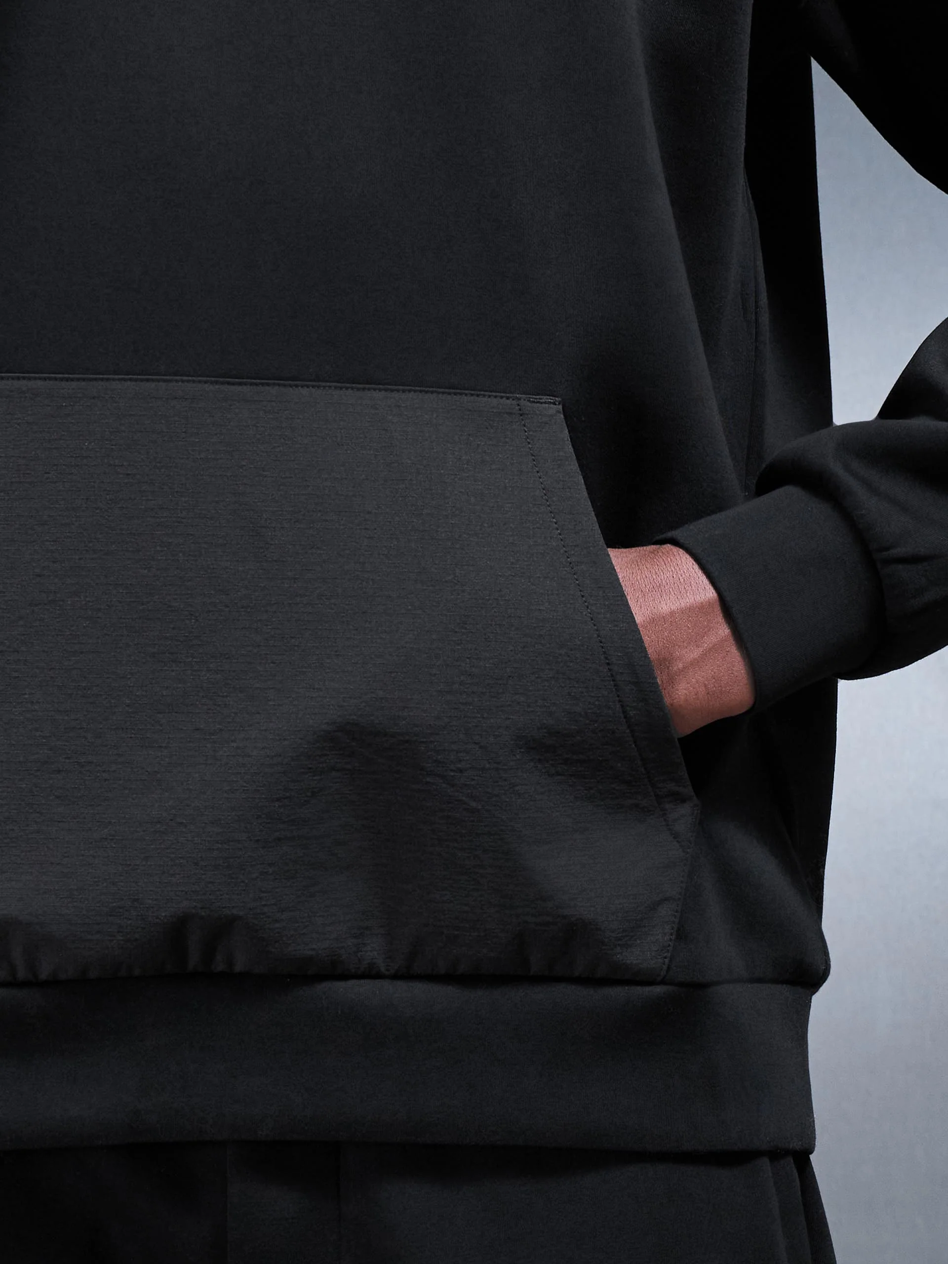 Interlock Jersey Hybrid Relaxed Hoodie in Black - Image 5