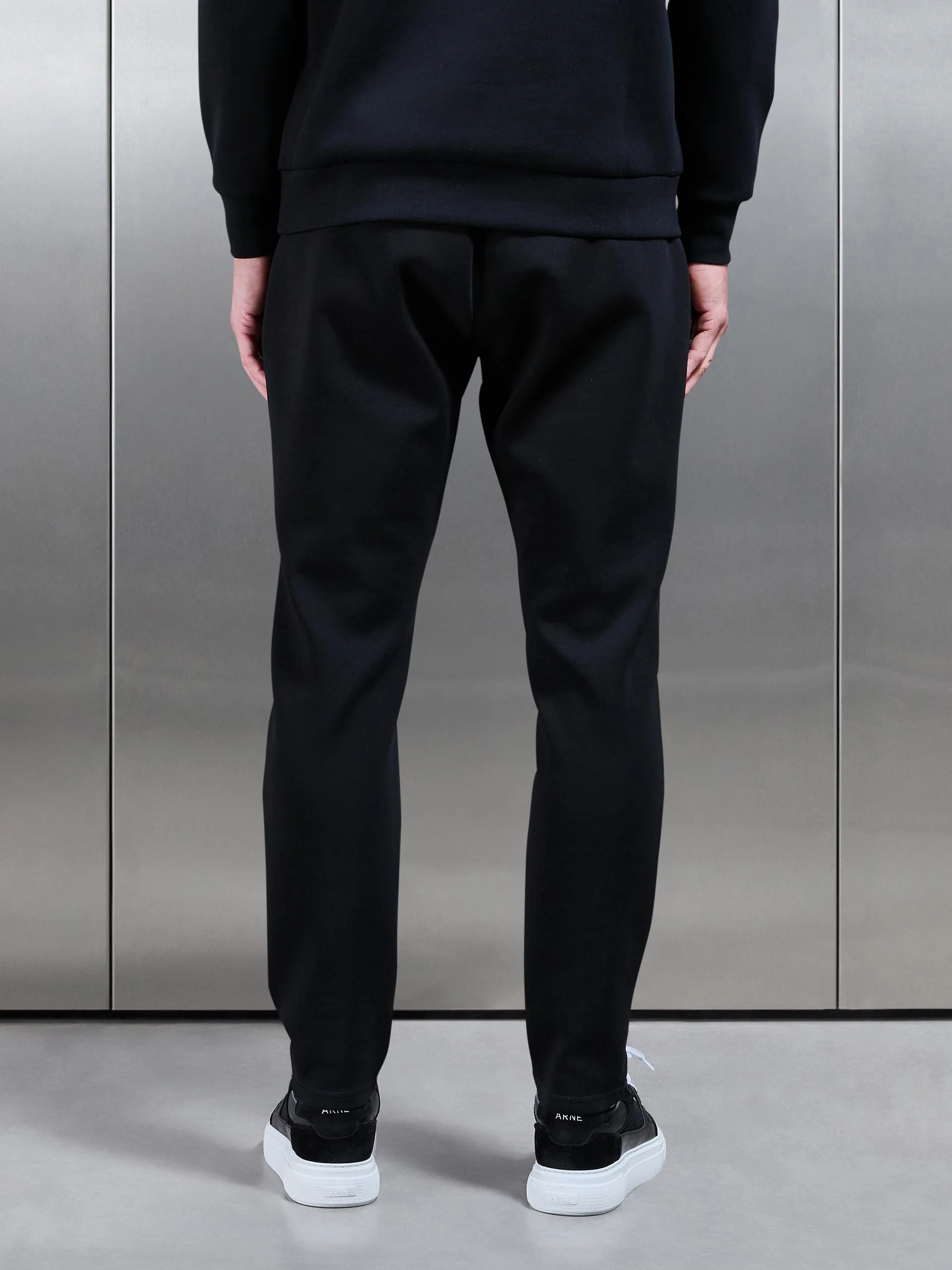 Interlock Jersey Tapered Jogger in Black - Image 3