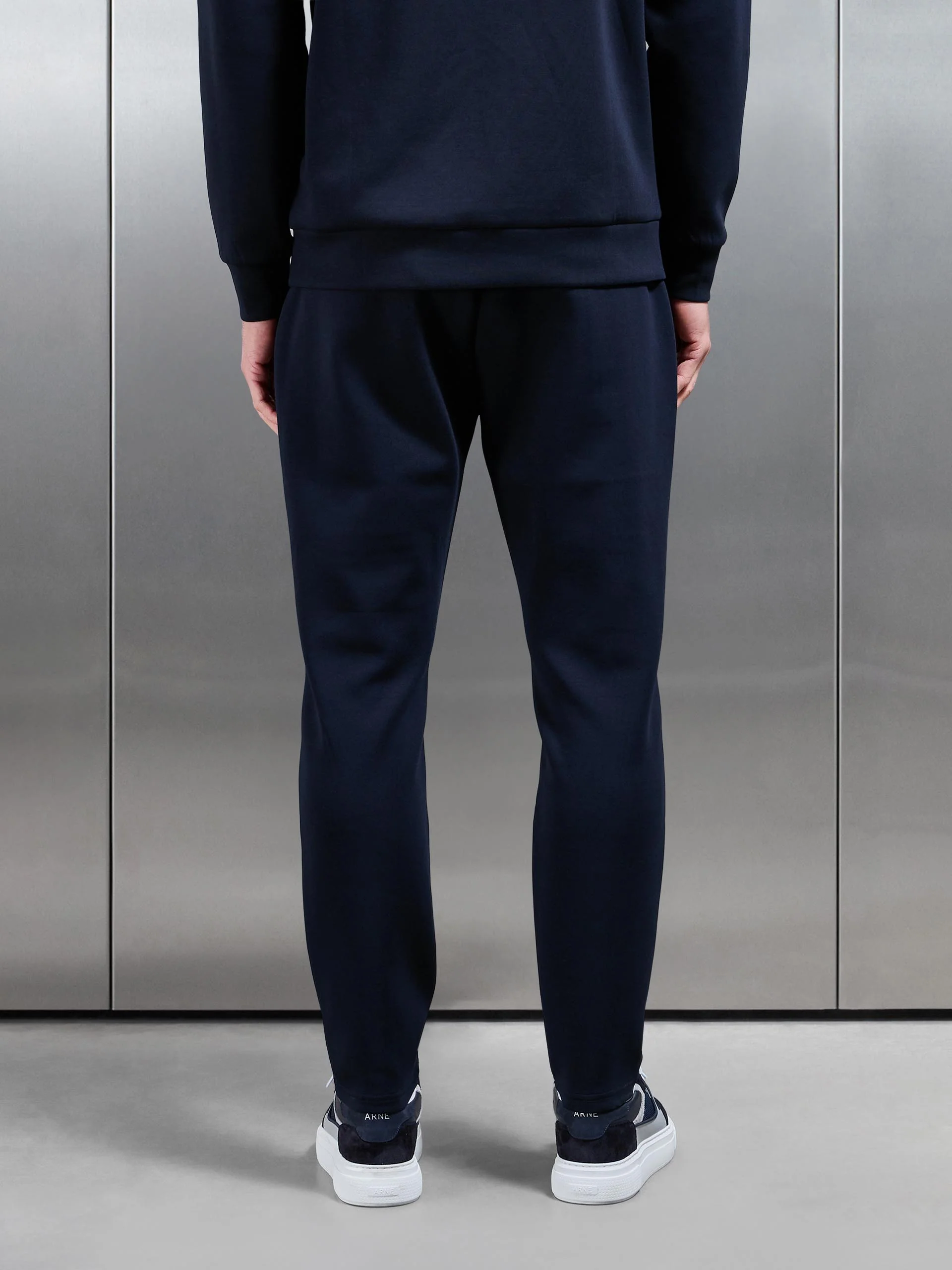 Interlock Jersey Tapered Jogger in Navy - Image 3