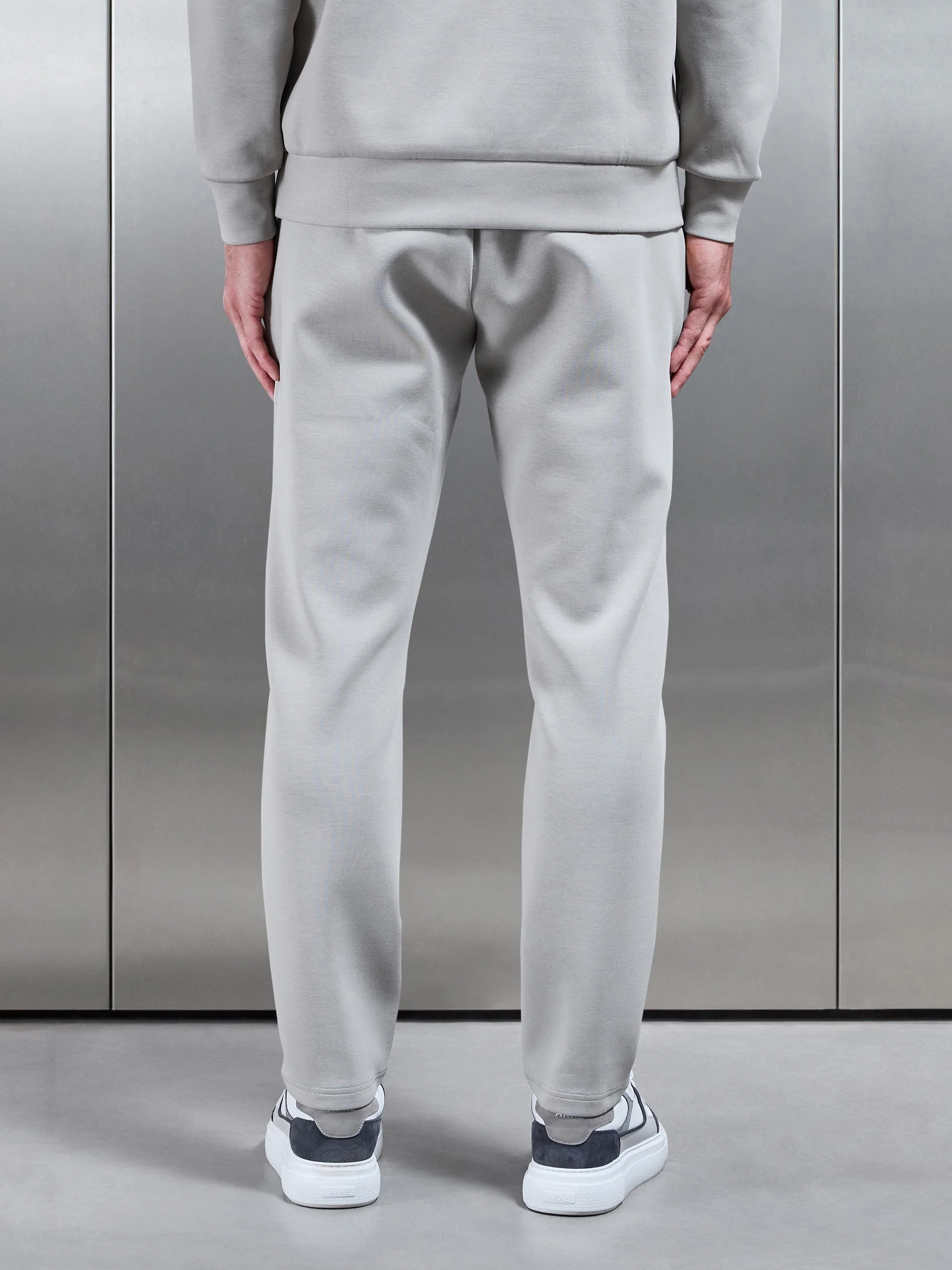 Interlock Jersey Tapered Jogger in Stone - Image 3