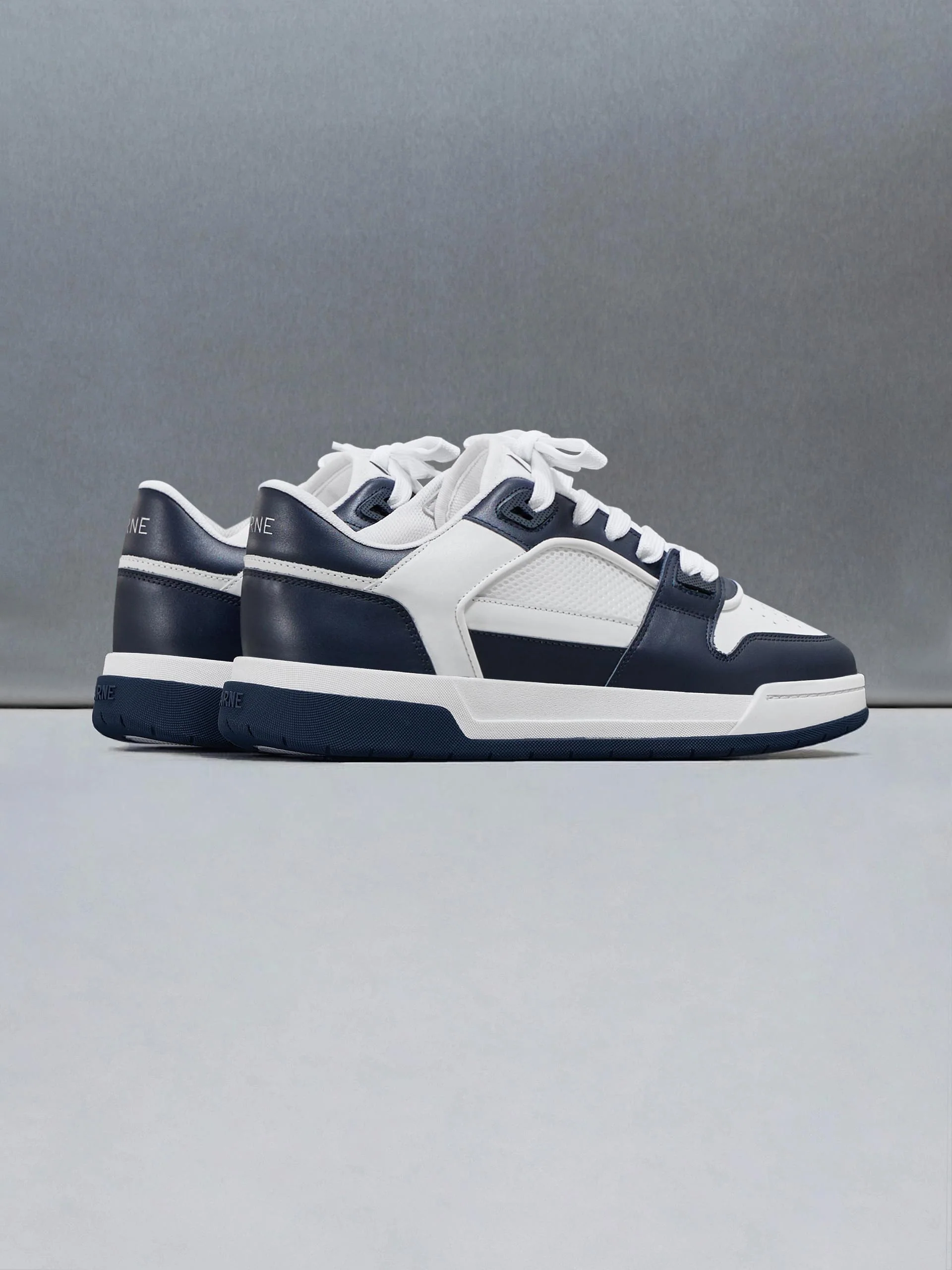 Leather Basket Trainer in White Navy - Image 4