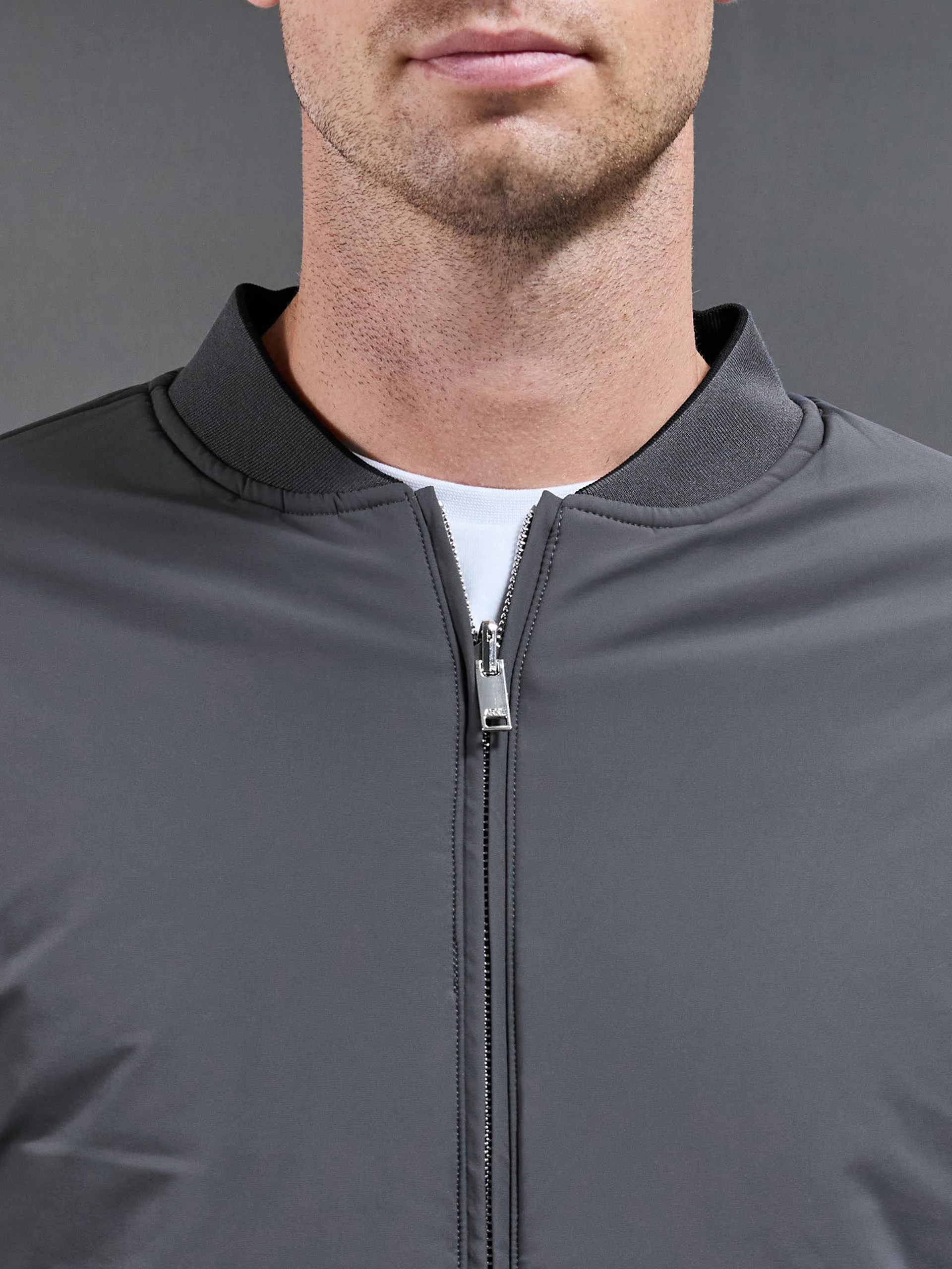 Relaxed Padded Reversible Bomber Jacket in Black Grey - Image 7